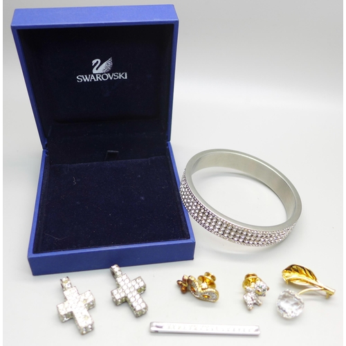 826 - A Swarovski bangle, boxed, and assorted Swarovski jewellery