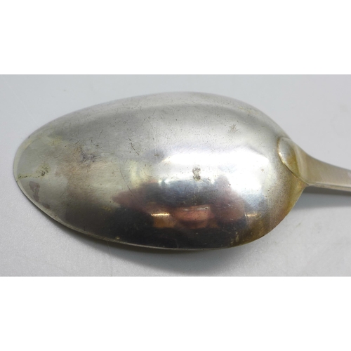 832 - A George III silver serving spoon, London 1812, 54g, a/f