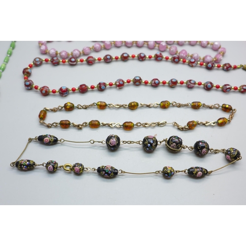 839 - Eight vintage glass bead necklets