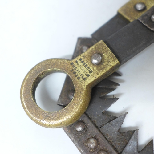 857 - A WWI trench saw marked Francis Wood & Son, Sheffield, 1918, in a leather case marked Jabez Cliff & ... 