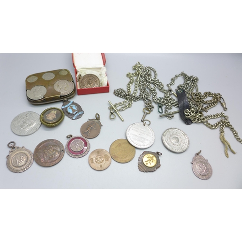 864 - A collection of medallions, coins and Albert chains