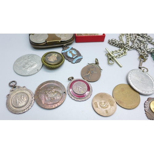 864 - A collection of medallions, coins and Albert chains