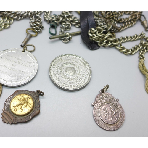 864 - A collection of medallions, coins and Albert chains