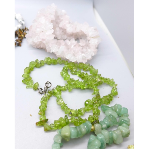 868 - A collection of twenty semi-precious stone necklaces and three bracelets