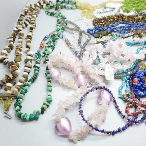 868 - A collection of twenty semi-precious stone necklaces and three bracelets