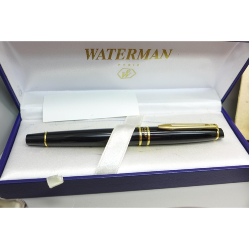 873 - A Waterman ink pen, a slab of Superfine Sealing Wax, travel clock, tin of medallions, plated cigaret... 