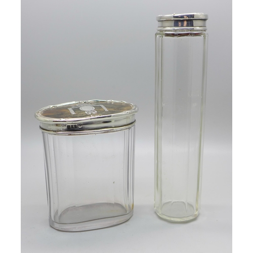 879 - Two silver and tortoiseshell topped glass jars