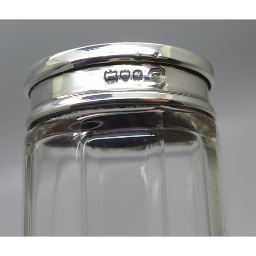 879 - Two silver and tortoiseshell topped glass jars