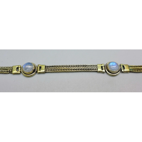 905 - A silver gilt and blue moonstone bracelet