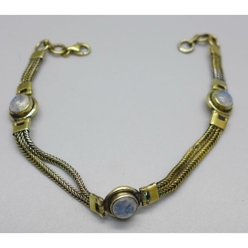 905 - A silver gilt and blue moonstone bracelet