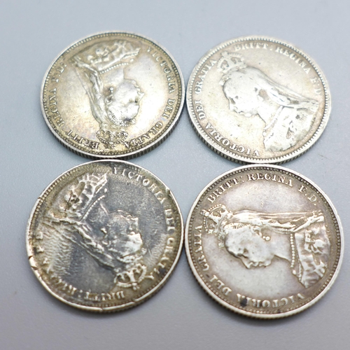 915 - Four Victorian Jubilee head shillings; 1887 x3 and 1888