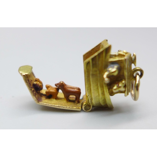 924 - A hallmarked 9ct gold Noah's Ark bracelet charm with animals, the bottom opening to reveal more anim... 