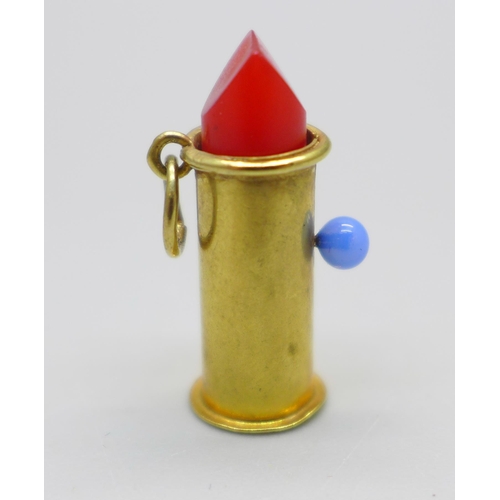 934 - A hallmarked 9ct gold lipstick charm, 1.6g