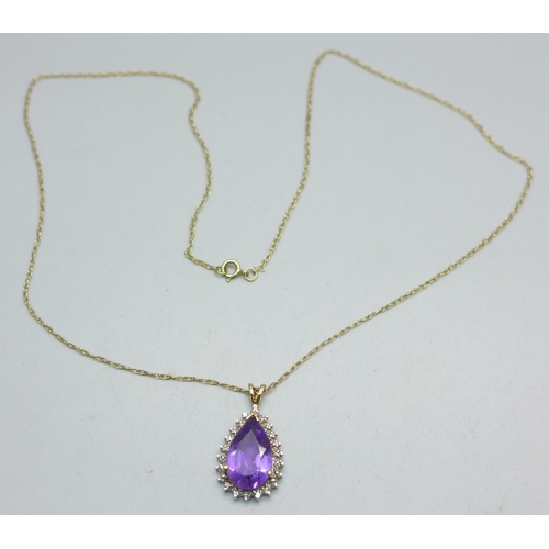 936 - A 9ct gold and amethyst pendant and chain, 2.9g