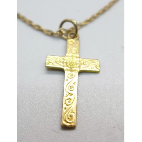 943 - A 9ct gold cross pendant and chain, 3.1g