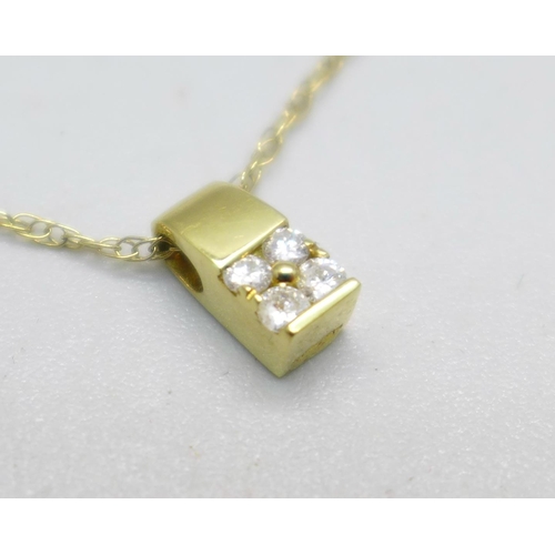 957 - An 18ct gold and diamond pendant on a 9ct gold chain, 1.6g