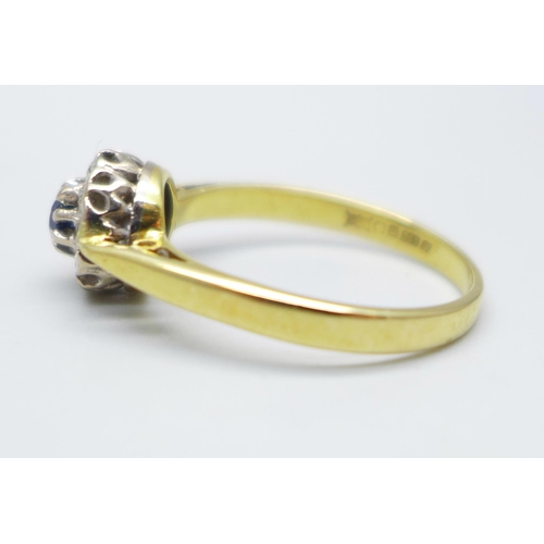 964 - An 18ct gold, sapphire and diamond cluster ring, 3.9g, R