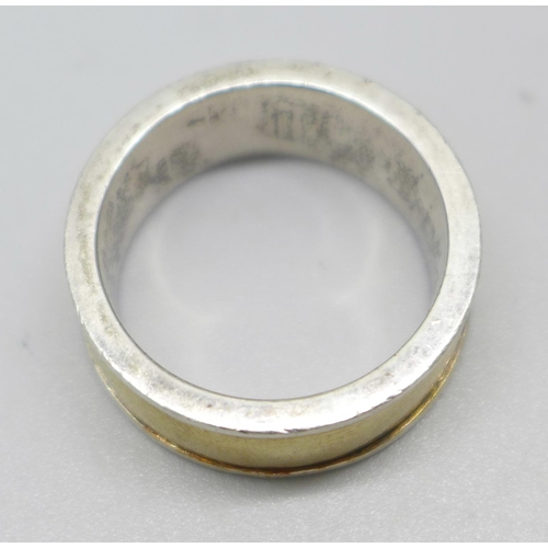 978 - A 9ct gold and silver ring, marked 9ct and sil, total weight 14.2g, W