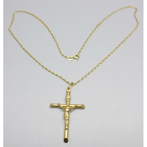 989 - A 9ct gold crucifix pendant and chain, 4g, chain 43cm