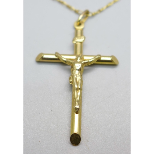 989 - A 9ct gold crucifix pendant and chain, 4g, chain 43cm