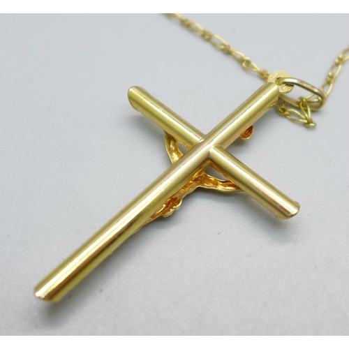 989 - A 9ct gold crucifix pendant and chain, 4g, chain 43cm