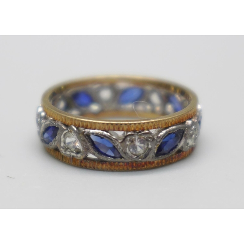 992 - A 9ct yellow and white gold, blue and white stone eternity ring, 3.4g, L