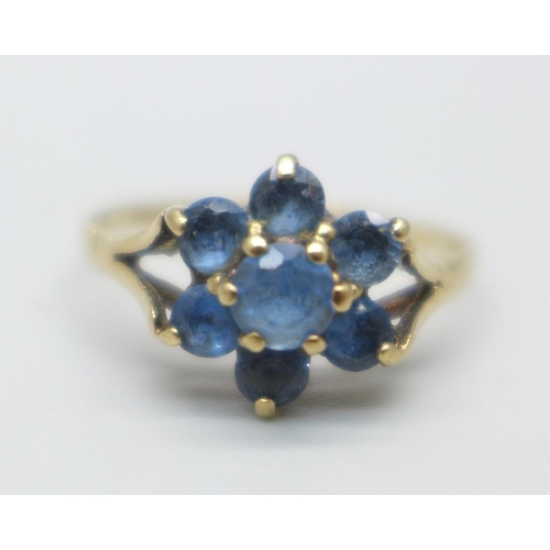 994 - A 9ct gold, seven blue stone flower cluster ring, 1.6g, N