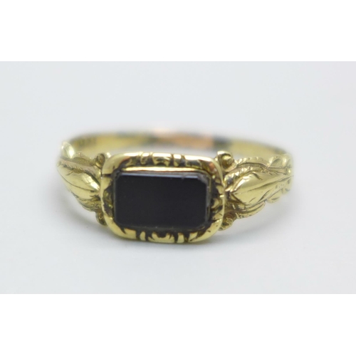 996 - A vintage yellow metal and onyx signet ring, 2.1g, S