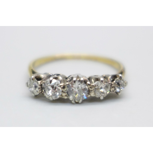 997 - A yellow metal and five stone diamond ring, graduated old cut, approximately 0.70ct diamond weight, ... 