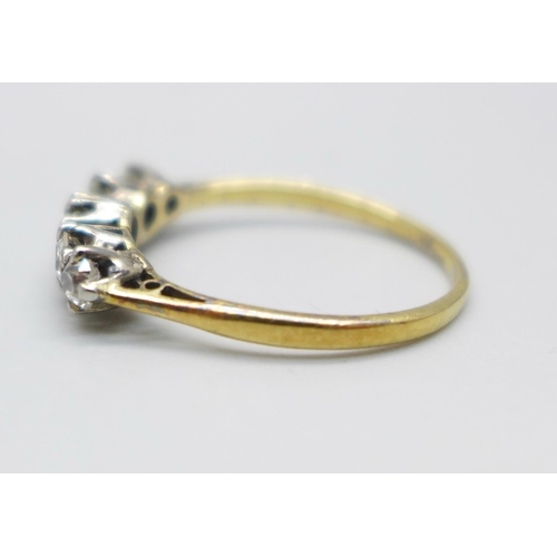 997 - A yellow metal and five stone diamond ring, graduated old cut, approximately 0.70ct diamond weight, ... 