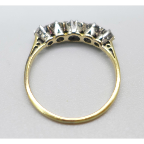 997 - A yellow metal and five stone diamond ring, graduated old cut, approximately 0.70ct diamond weight, ... 