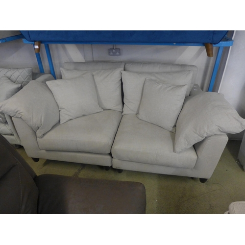 1569 - An extra deep taupe upholstered two seater sofa