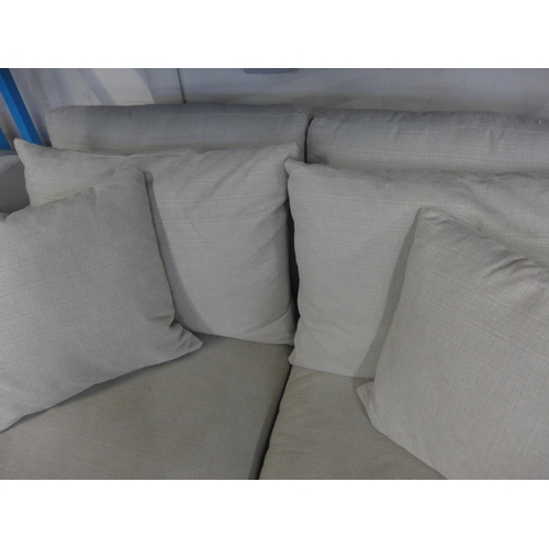 1569 - An extra deep taupe upholstered two seater sofa