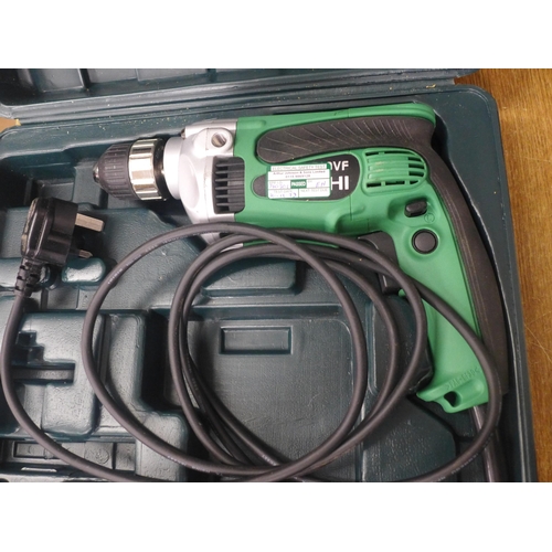 2059 - A Black & Decker professional heat gun (P8701K) and a Hitachi power drill (D10VF)