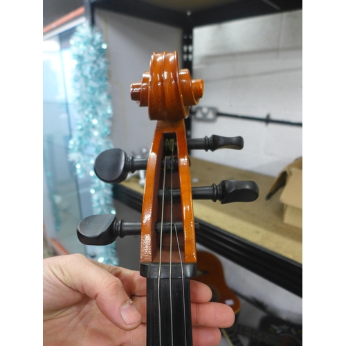 2095 - A cello with bow and a soft case