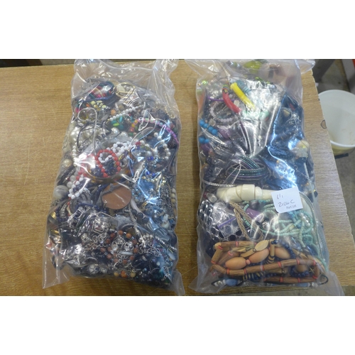 2104C - Two bags of costume jewellery