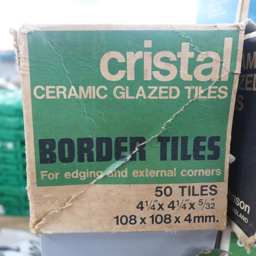 2224 - 12 boxed of Cristal ceramic glazed border tiles and a quantity of spacer tiles