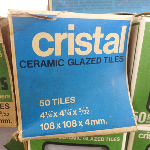 2224 - 12 boxed of Cristal ceramic glazed border tiles and a quantity of spacer tiles