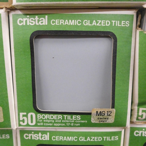 2224 - 12 boxed of Cristal ceramic glazed border tiles and a quantity of spacer tiles