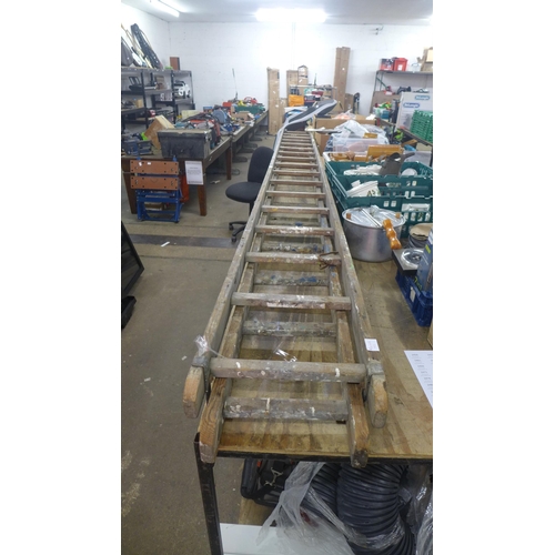 2286 - A double wooden ladder 17 rung