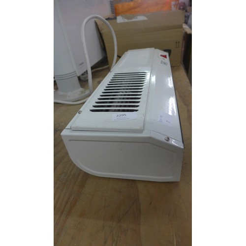 2295 - A wall mounted fan heater