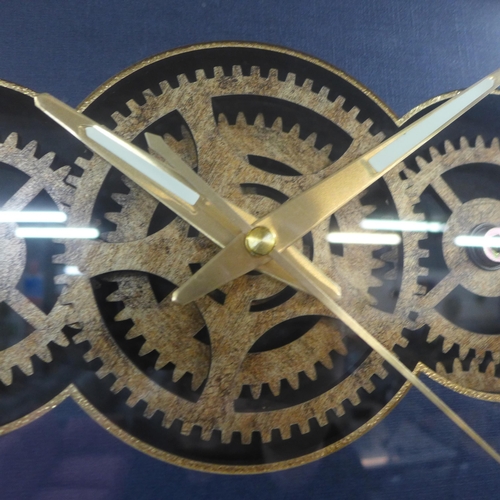 1390 - A moving gears wall clock