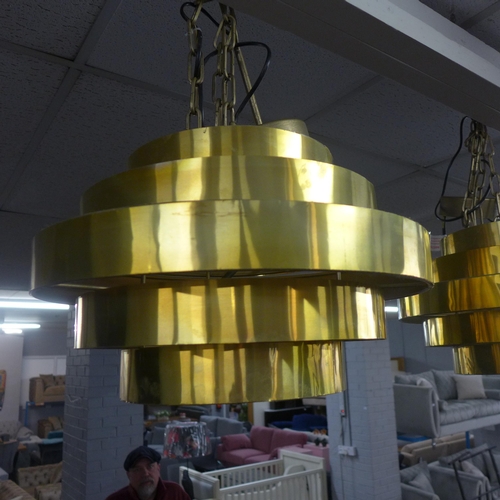 1463 - A pair of gold retro ceiling pendants