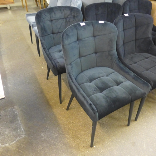 1501 - A pair of Kos black velvet dining chairs