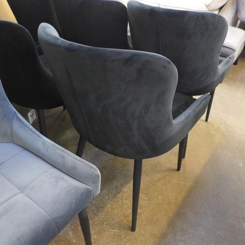 1501 - A pair of Kos black velvet dining chairs