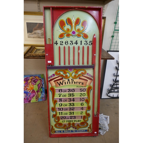 431 - A 1950s painted fairground/carnival wooden bagatelle style table top game