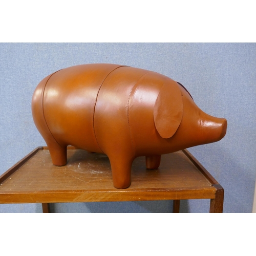 434 - A Liberty's style brown leather pig stool