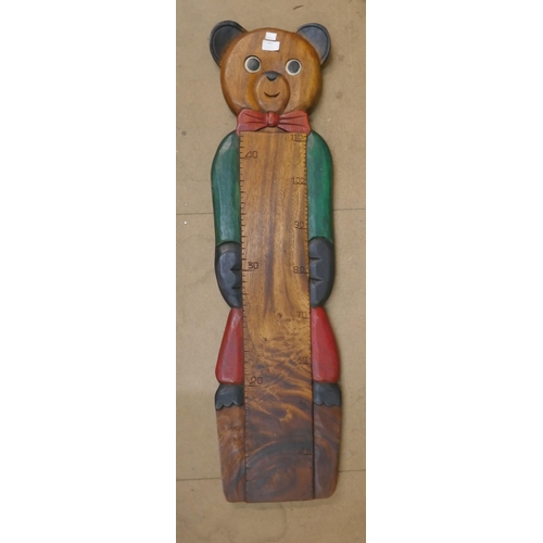 442 - A wooden bear wall mounted measuring stick