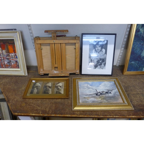 479 - An aviation oil on canvas, two photographic prints and a small artist's easel