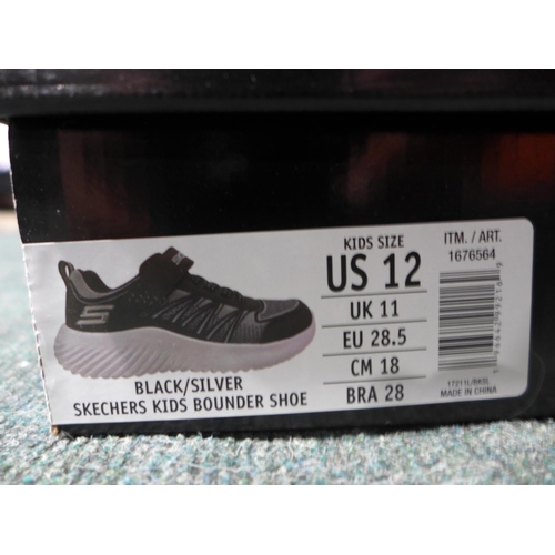 3138 - Pair of kid's black and silver Skechers trainers - size 11 * This lot is subject to VAT